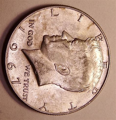 1967 kennedy half dollar errors - 1967 No Mint Mark Half Dollar Value. Price: $3.00 to $4.00 (in circulated condition), $10.00 to $20.00 (in uncirculated condition) The 1967 Kennedy half dollar is a business strike currency that was produced in Philadelphia and lacked a mint mark. The coin has a reeded edge and is 60% copper and 40% silver in composition.